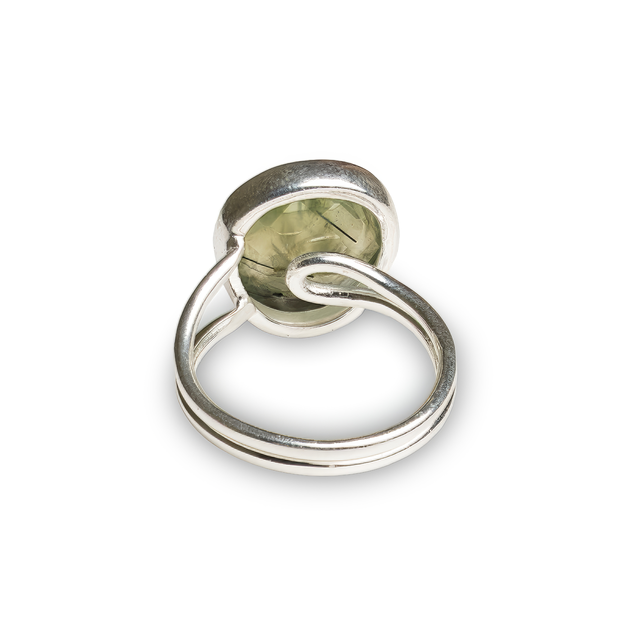 Minimalist sterling silver ring featuring a bezel-set oval prehnite gemstone with natural inclusions. A refined and elegant design inspired by Nordic simplicity, celebrating the beauty of imperfection and natural charm.