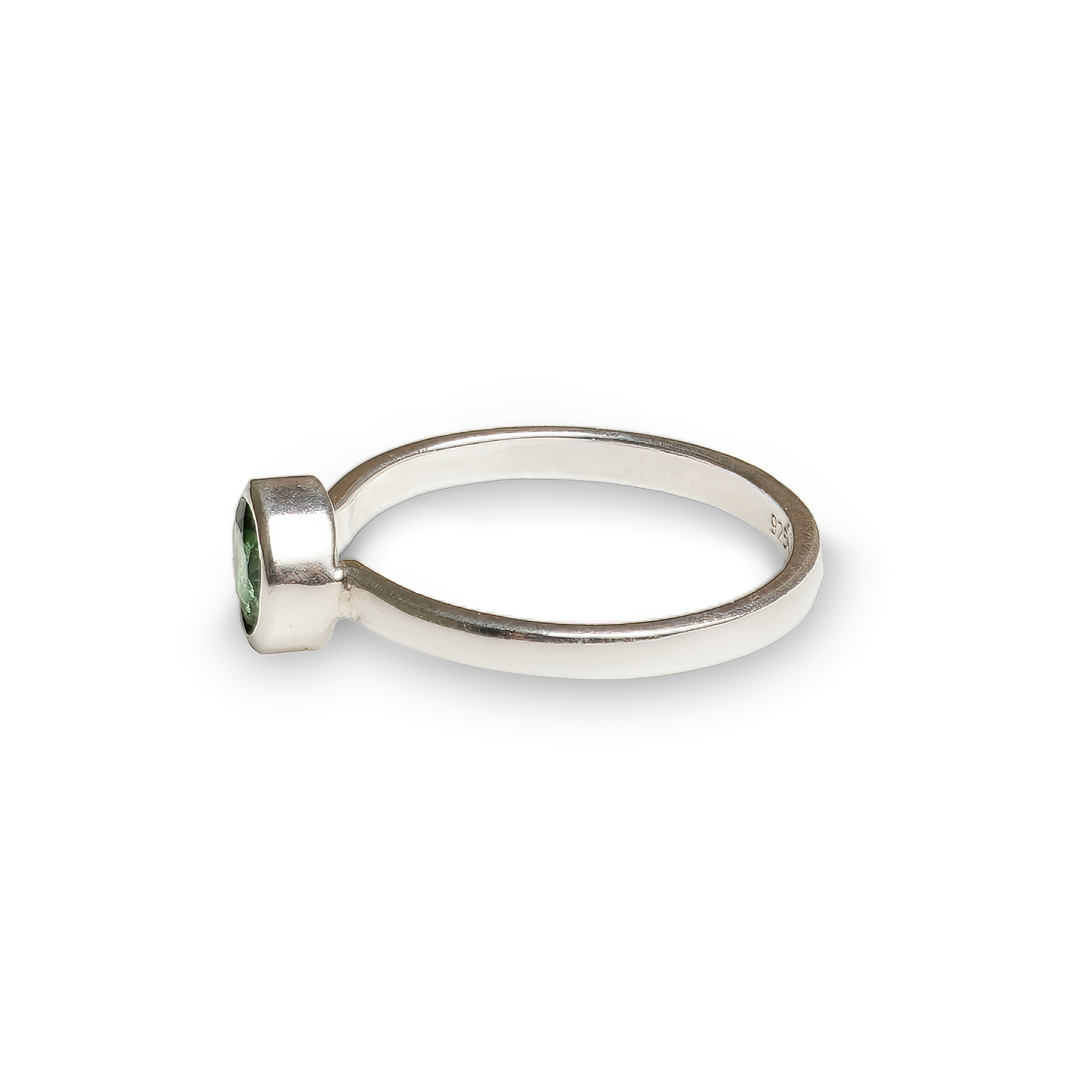 Minimalist sterling silver ring featuring a bezel-set round green tourmaline gemstone. A sleek and timeless design inspired by Nordic simplicity, celebrating natural beauty and understated elegance.